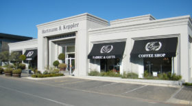 Curved fixed canopy